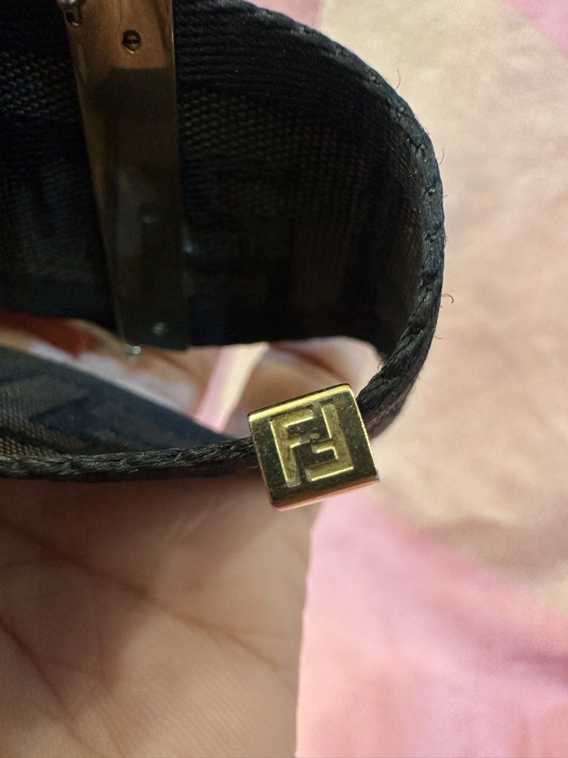 Fendi “Zip Code” Reversible Cuff Watch (Ref. 1130G) (Category: Luxury Watches) located in Pasig City. Submitted by surplusatbp (Listing ID 1442532253, Image 3). Description: Fendi “Zip Code” Reversible Cuff Watch (Ref. 1130G) Swiss movement ISA Caliber 257 With original woven Zucca FF monogram canvas cuff strap With signs of use pwede niyo ipa gold platting Sapphire Crystal Php 9,500.
