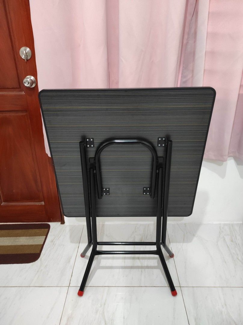 Foldable table (Category: Tables & Sets) located in Manila. Submitted by hzlblx (Listing ID 1442389591, Image 3). Description: Black (marble-ish) foldable table. Preferred for pick up/delivery. .