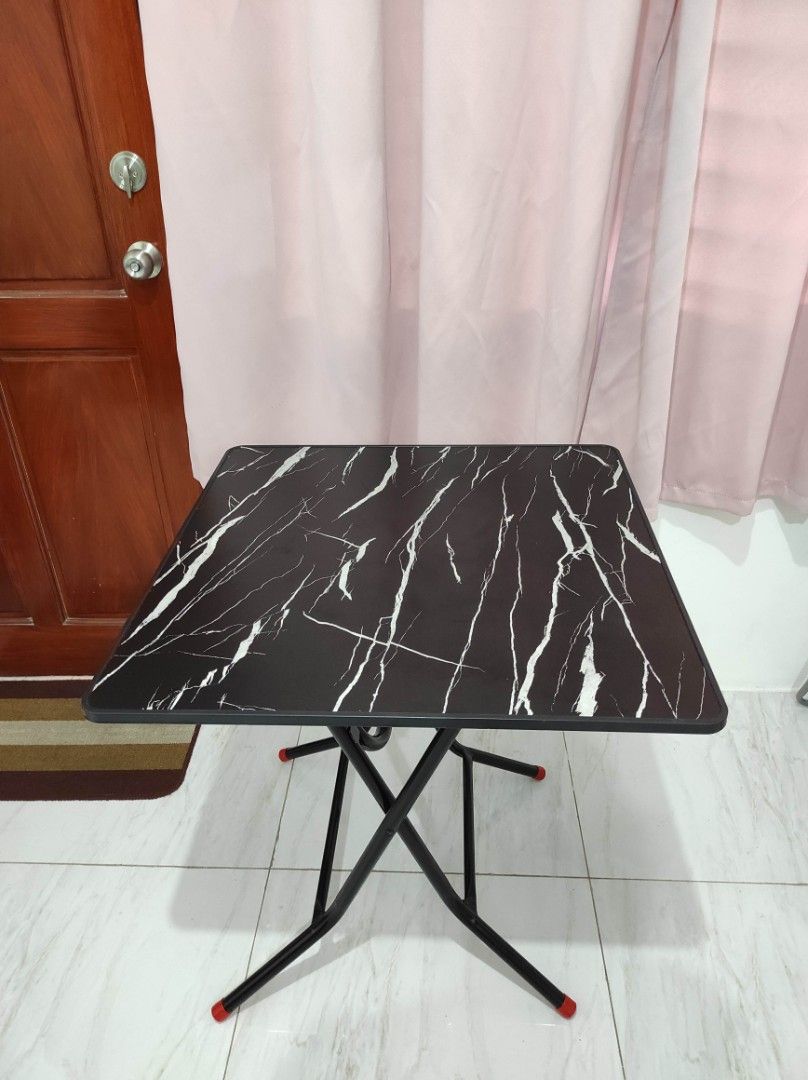 Foldable table (Category: Tables & Sets) located in Manila. Submitted by hzlblx (Listing ID 1442389591, Image 1). Description: Black (marble-ish) foldable table. Preferred for pick up/delivery. .