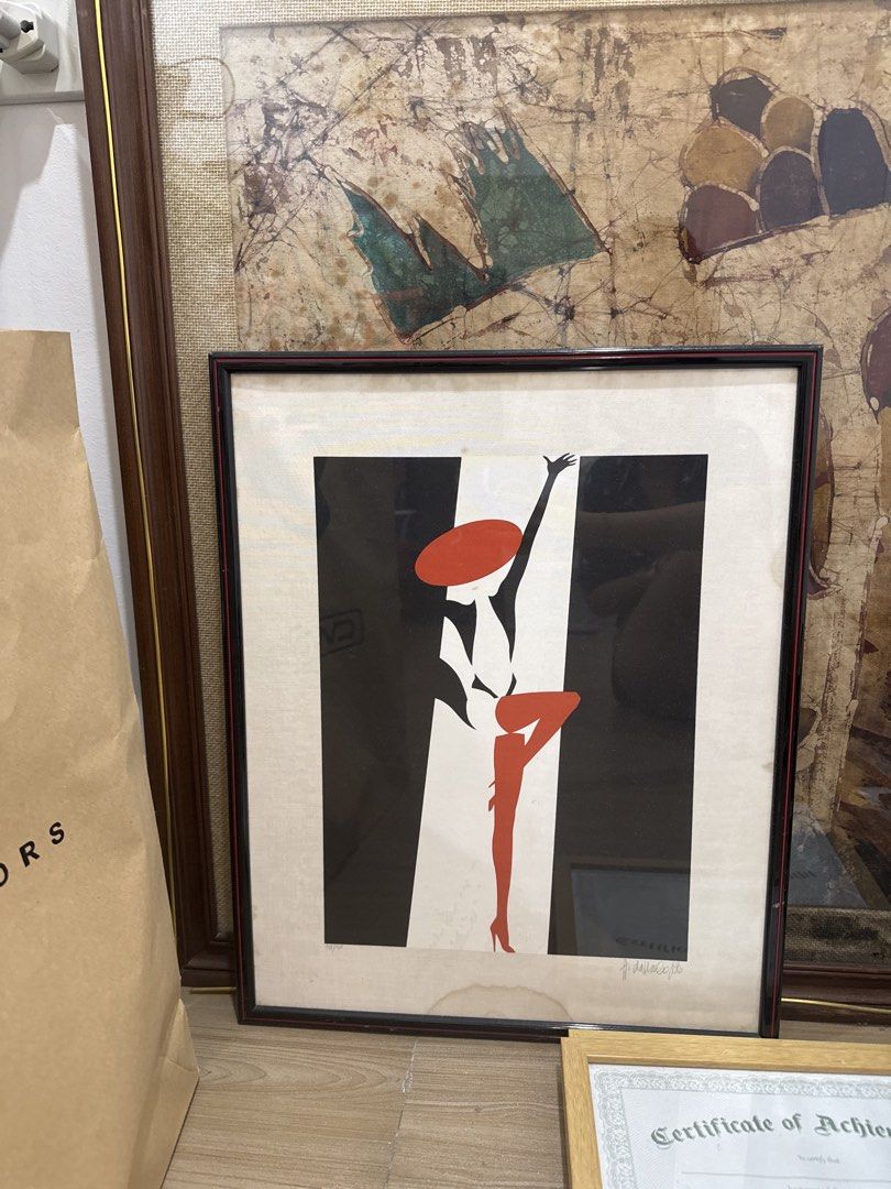 Framed Art Print - Dancer Silhouette (Category: Art & Prints) located in Quezon City. Submitted by heylouise (Listing ID 1442406693, Image 1). Description: - Stylized dancer art print - Black and white background with striking red accents - Comes in a dark wood frame - Perfect wall decor - Ready to hang.