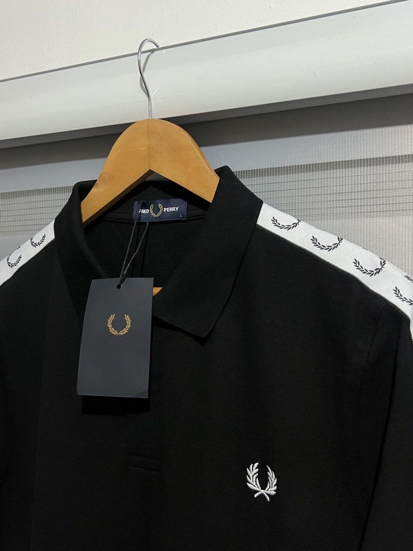 Fred Perry Taped Polo Shirt (Category: Tshirts & Polo Shirts ) located in Cavite. Submitted by PRIVATE.Selection (Listing ID 1442515571, Image 3). Description: Fred Perry Taped Polo Shirt Size Large and XL available Large: 22x28 XL: 23x29 Brand new w hangtags .