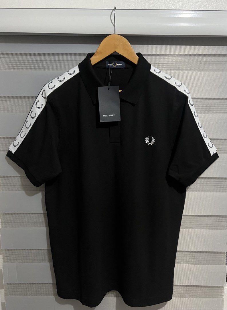 Fred Perry Taped Polo Shirt (Category: Tshirts & Polo Shirts ) located in Cavite. Submitted by PRIVATE.Selection (Listing ID 1442515571, Image 1). Description: Fred Perry Taped Polo Shirt Size Large and XL available Large: 22x28 XL: 23x29 Brand new w hangtags .