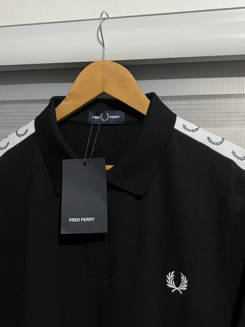 Fred Perry Taped Polo Shirt (Category: Tshirts & Polo Shirts ) located in Cavite. Submitted by PRIVATE.Selection (Listing ID 1442515571, Image 2). Description: Fred Perry Taped Polo Shirt Size Large and XL available Large: 22x28 XL: 23x29 Brand new w hangtags .