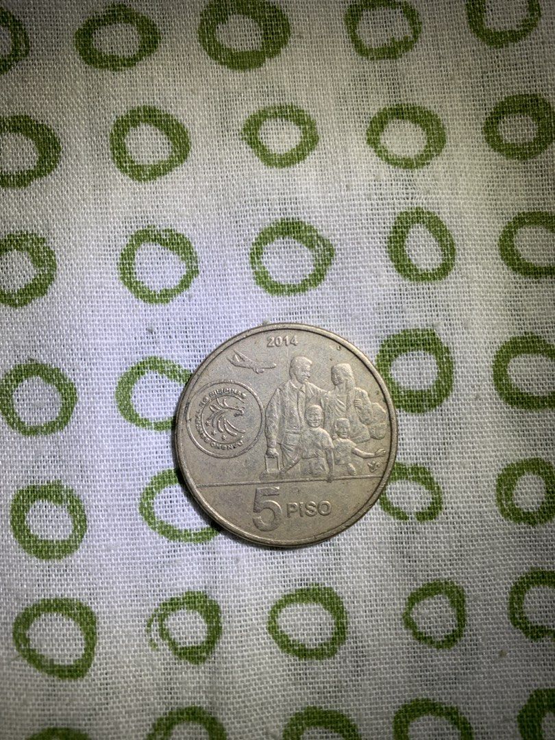 FREE SF | Philippine Coins bundle (Category: Currency) located in Iligan City. Submitted by prelovedbyspg (Listing ID 1442400571, Image 2). Description: - 1992 2-peso Andres Bonifacio coin. - 2014 5-peso commemorative Bagong Bayani coin..