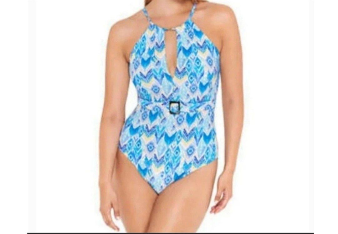 Gottex One-Piece Swimsuit (Category: Bikinis & Swimsuits) located in Angeles City. Submitted by n_cln (Listing ID 1442533241, Image 1). Description: - Gottex Women’s Bathing Suit - lightly used - size: 10 (fits S-M) - Colour: Blue, White - Composition: 82% nylon, 18% spandex; Mesh lining: 86% nylon, 14% spandex; Lining: 92% polyester, 8% spandex - Ajustable straps - has some sticky marks/adhesive residue from clothing/tag sticker which does not a