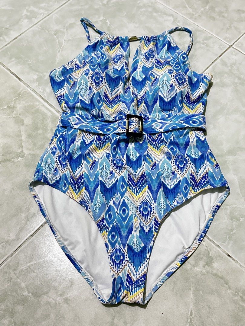 Gottex One-Piece Swimsuit (Category: Bikinis & Swimsuits) located in Angeles City. Submitted by n_cln (Listing ID 1442533241, Image 3). Description: - Gottex Women’s Bathing Suit - lightly used - size: 10 (fits S-M) - Colour: Blue, White - Composition: 82% nylon, 18% spandex; Mesh lining: 86% nylon, 14% spandex; Lining: 92% polyester, 8% spandex - Ajustable straps - has some sticky marks/adhesive residue from clothing/tag sticker which does not a