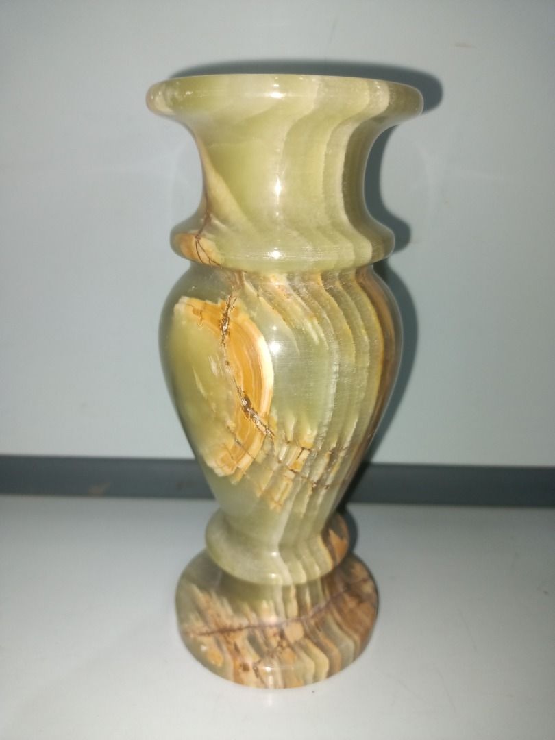Green Onyx Vase with Natural Veining (Category: Vases & Decorative Bowls) located in Munoz. Submitted by larryc1212 (Listing ID 1442415499, Image 2). Description: - Stunning green onyx vase - Approximately 6 inches in height - Features unique natural veining and color variations - Ideal for small floral arrangements - Adds a natural, decorative touch to any room - Great for desks, shelves, or tabletops Disclaimer: Item may include some scratches 