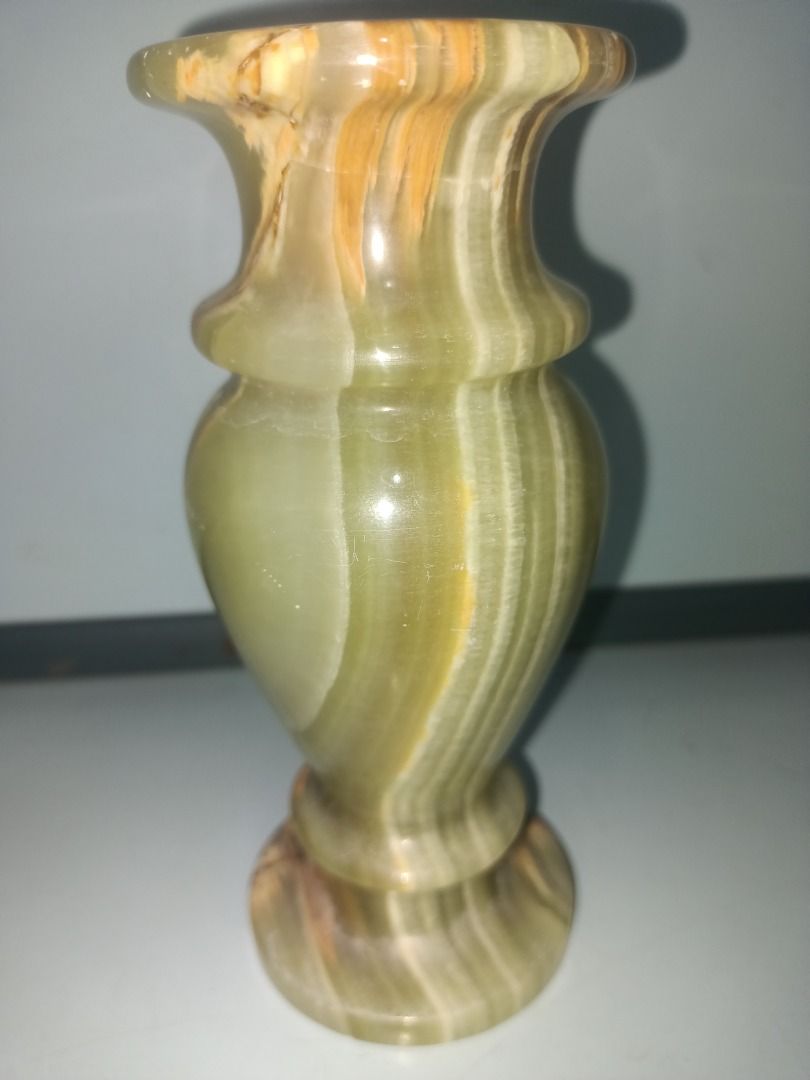 Green Onyx Vase with Natural Veining (Category: Vases & Decorative Bowls) located in Munoz. Submitted by larryc1212 (Listing ID 1442415499, Image 3). Description: - Stunning green onyx vase - Approximately 6 inches in height - Features unique natural veining and color variations - Ideal for small floral arrangements - Adds a natural, decorative touch to any room - Great for desks, shelves, or tabletops Disclaimer: Item may include some scratches 