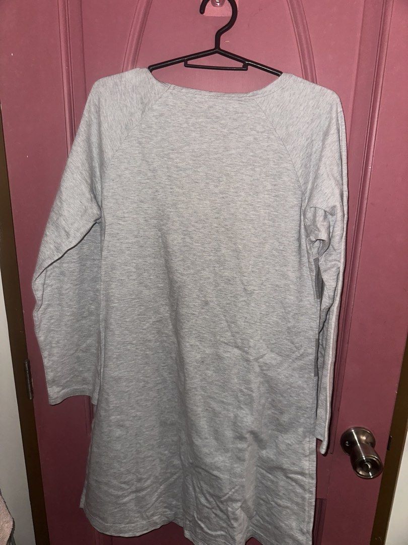 Grey Long Sleeve Sweater Dress (Category: Dresses) located in Manila. Submitted by itemsbykeiko (Listing ID 1442482686, Image 2). Description: - Grey long sleeve dress - Crew neck with raglan sleeves - Hits around mid-thigh - Comfortable and casual style - Versatile for layering or wearing solo - Pairs well with boots or sneakers - Ideal for everyday wear.