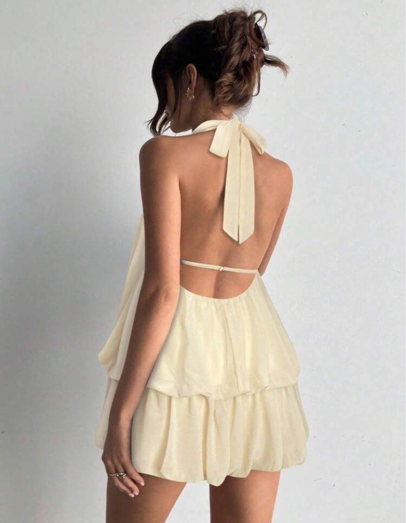 Halter Neck Ruffled Hem Mini Dress (Category: Dresses) located in Tanauan. Submitted by leilaaa2000 (Listing ID 1442442356, Image 2). Description: Used once for pictures in Vietnam! .