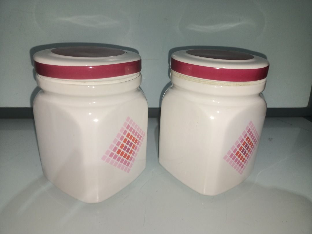 Hamco Ceramic Storage Jar with Lid P220 each (Category: Food Organization & Storage) located in Munoz. Submitted by larryc1212 (Listing ID 1442411506, Image 2). Description: - White ceramic storage jar - Pink lid with rubber seal for freshness - Decorative geometric pattern on the side - Approximately 5.5 inches tall - Ideal for storing dry goods in the kitchen - Made by Hamco - Heavy and durable Disclaimer: Item may include some scratches due to