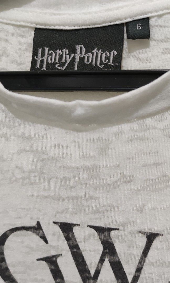 harry potter souvenir shirt (Category: Shirts) located in Quezon City. Submitted by miscellanyfinds (Listing ID 1442398964, Image 2). Description: preloved. in very good condition size UK 6 souvenir shirt, bought from the UK. rfs: medical assistance.