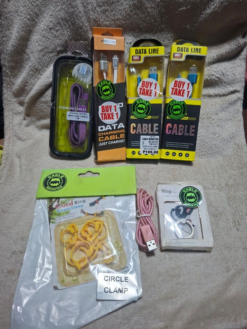 IPHONE CABLE ASSORTED SET B (Category: Cables & Adaptors) located in Muntinlupa City. Submitted by jsassorteditems (Listing ID 1442469454, Image 1). Description: - 3 packs of 'Buy 1 Take 1' Data Line charging cables - 1 purple charging cable in a protective case - 1 pink USB cable - 1 pack of circle clamps - Excellent value bundle for all your charging needs!.