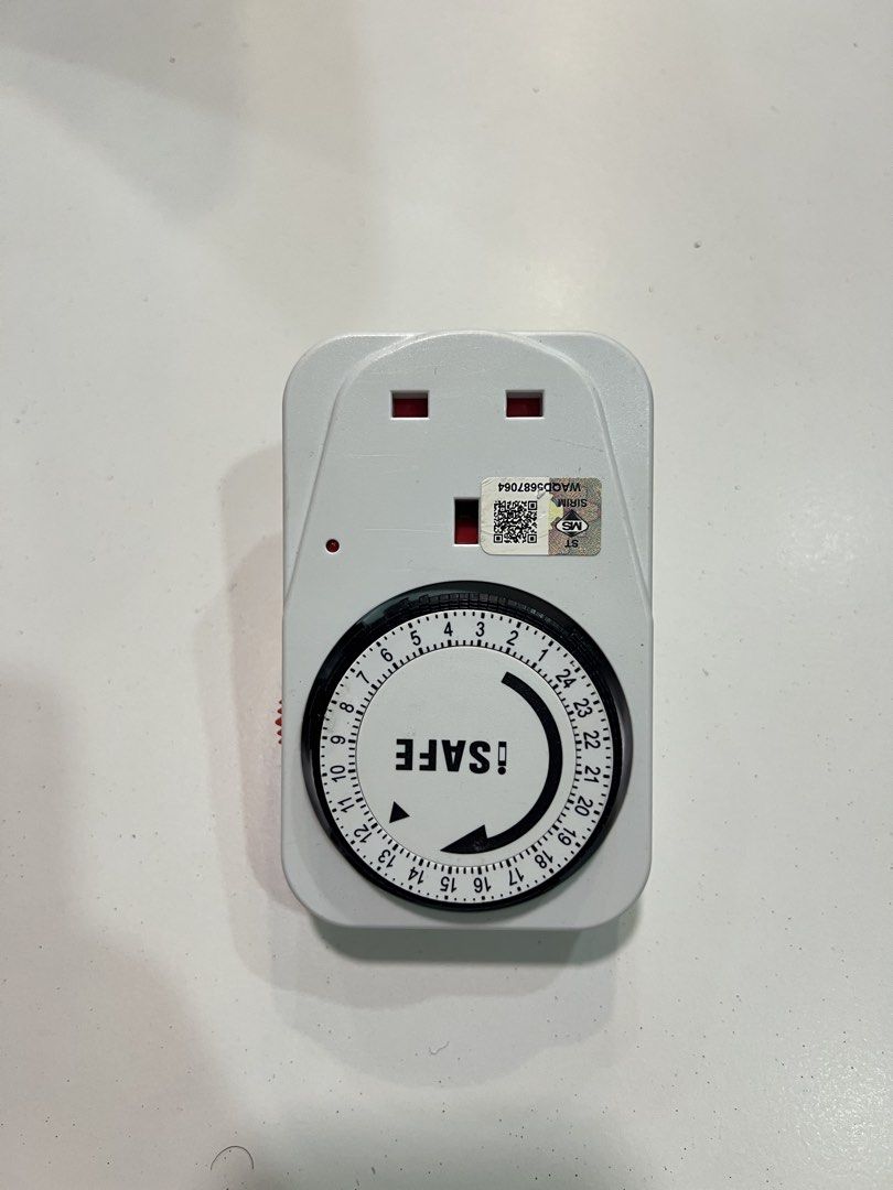 iSAFE Mechanical Timer Plug (Category: Electrical, Adaptors & Sockets) located in Singapore. Submitted by kangkae (Listing ID 1442490587, Image 1). Description: - Mechanical timer plug for appliance scheduling - Easy dial setting for desired on/off times - Simple plug-and-play setup - Ideal for controlling lights, fans, and other devices - Fully functional and works as intended.