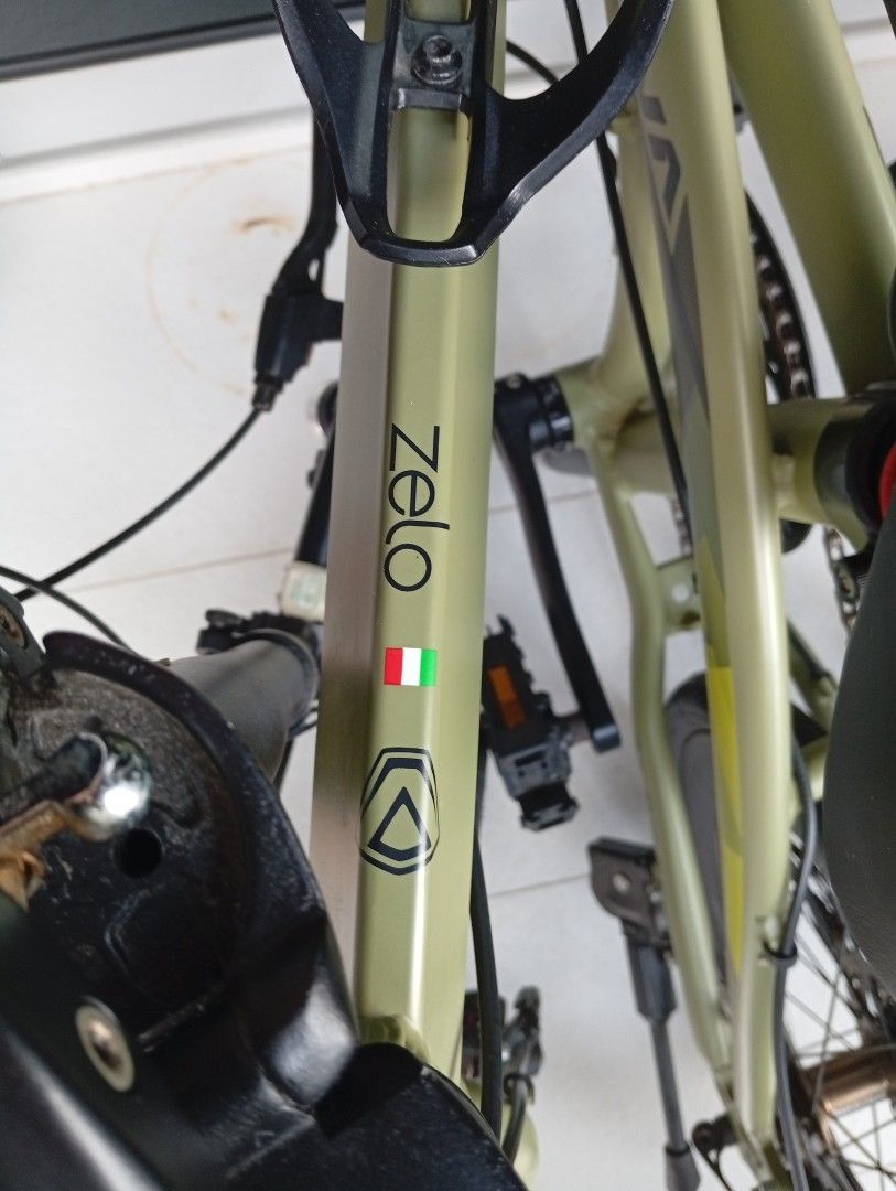 JAVA Zelo Folding Bicycle (Category: Bicycles) located in Singapore. Submitted by maxmaxboi (Listing ID 1442531939, Image 2). Description: - JAVA Zelo Folding Bike - Color: Olive Green - Brakes: Disc Brakes - Wheel Size: 16-inch - Ideal for: Commuting and casual rides - Features: Folds for easy storage and transport - Condition: Ready for its next owner selling both for $500 used only once. selling for a friend. Buyer to check thoroughly before d
