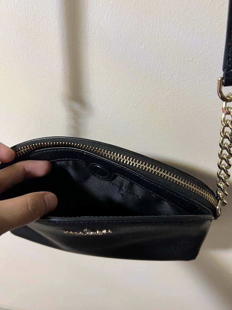 Kate Spade Black Leather Crossbody Bag (Category: Cross-body Bags) located in Dagupan City. Submitted by kamilpicks (Listing ID 1442404399, Image 3). Description: - Authentic Kate Spade black leather crossbody bag - Elegant gold chain strap - Compact size, ideal for carrying essentials - Secure zipper closure - Convenient interior pocket - Perfect for casual day or evening use -STILL NEGOTIABLE.