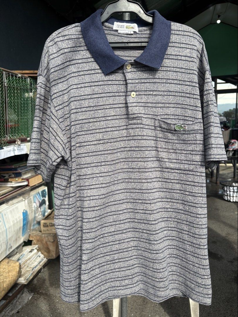 Lacoste Striped Polo Shirt - Size L (Category: Tshirts & Polo Shirts ) located in Manila. Submitted by nickfernan45655 (Listing ID 1442384149, Image 1). Description: - Lacoste 22x 28 Dimes - Washed - Logo on chest pocket.