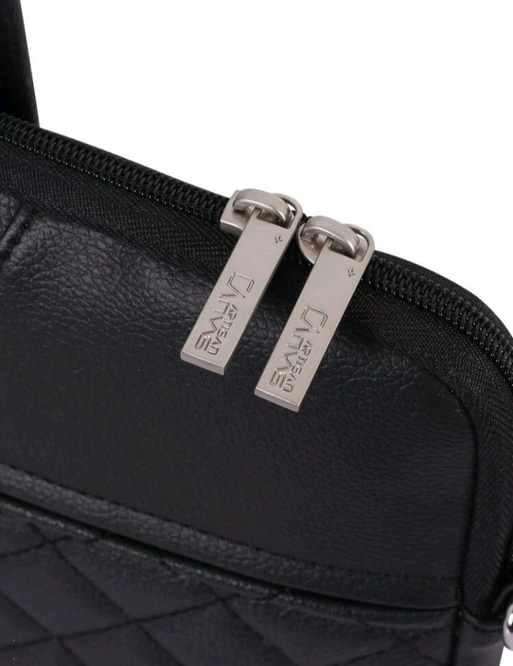 Laptop Bag with Removable strap (Category: Laptop Bags & Sleeves) located in Manila. Submitted by dsweetest (Listing ID 1442530847, Image 2). Description: - Excellent condition; Like new - Black quilted laptop bag by CanvasArtisan - Front zip pocket for essentials - Luggage strap for easy travel - Detachable shoulder strap included - Ideal for daily use or travel - Fits laptops or tablets - Just used twice.