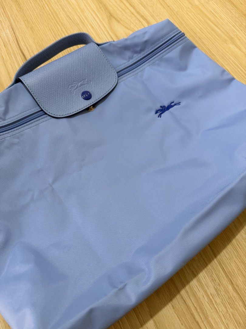 Authentic Longchamp Briefcase (Category: Luxury Bags & Wallets) located in Paranaque City. Submitted by akpoker (Listing ID 1442356315, Image 2). Description: Used only once. Original price is P9K+. Selling for almost half the price..