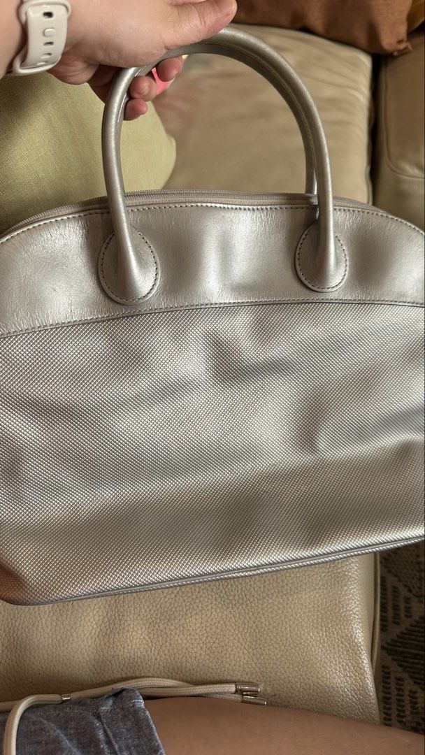 LONGCHAMP Structured Satchel / Bowling Bag with Shoulder Strap (Category: Luxury Bags & Wallets) located in Cebu City. Submitted by calligraphybyden (Listing ID 1442416107, Image 2). Description: Authentic Longchamp structured satchel in a versatile silver shade. One of the best features of this bag is its structured design—it stands upright beautifully on its own and keeps its shape even when not fully packed. Perfect for those who prefer a bag 