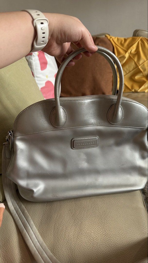 LONGCHAMP Structured Satchel / Bowling Bag with Shoulder Strap (Category: Luxury Bags & Wallets) located in Cebu City. Submitted by calligraphybyden (Listing ID 1442416107, Image 1). Description: Authentic Longchamp structured satchel in a versatile silver shade. One of the best features of this bag is its structured design—it stands upright beautifully on its own and keeps its shape even when not fully packed. Perfect for those who prefer a bag 