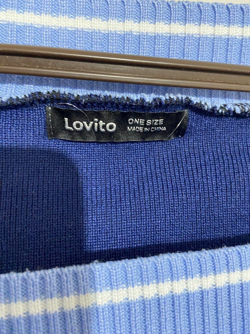 Lovito Blue V-Neck Cropped Sweater One Size (Category: Coats, Jackets and Outerwear) located in Valenzuela. Submitted by decluttermaniac (Listing ID 1442353505, Image 2). Description: - Lovito blue cropped sweater - V-neck design with light blue and white striped trim - Ribbed cuffs and hem - One size fits most - Versatile for layering or standalone wear.