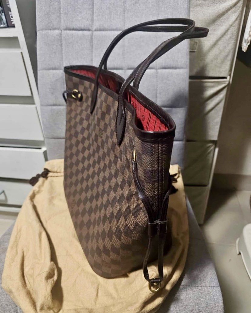LV Never Full MM Shoulder Bag🤎 (Category: Luxury Bags & Wallets) located in Manila. Submitted by luxurycollectionhouse (Listing ID 1442462980, Image 3). Description: 100% Authentic|Original‼️ Strictly No Return No Exchange Unless Proven Fake By A Legitimate Third Party Authenticator, We Do Money Back Guarantee❗️‼️❗️ INCLUSIONS: Original LV Dustbag And Paper Bag. CONDITION:In Very Good Condition With Sign Of Usage. Color: Browns. Size: MM. Materi