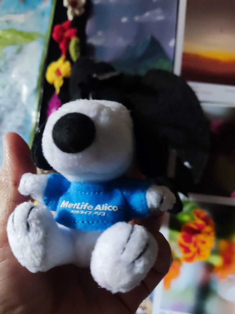 MetLife Alico Snoopy Plush Keychain (Category: Plushies & Soft Toys) located in Pateros City. Submitted by starry__night__20951 (Listing ID 1442381758, Image 2). Description: - Adorable Snoopy plush keychain - Features the MetLife Alico logo on its shirt - Equipped with a sturdy metal clasp for easy attachment - Ideal for personalizing bags or keys - Compact and portable size -size: approx 3inches - collector's item Price: 249.