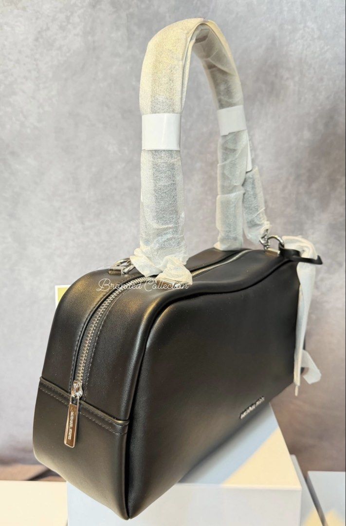 Michael Kors Cecily Shoulder Bag Black (Category: Shoulder Bags) located in Manila. Submitted by usbrandedcollections (Listing ID 1442347382, Image 3). Description: SKU: BAG-MKC-0020 Cecily Medium Shoulder Bag Black. Polyurethane blend, 75% polyurethane 25% polyester. Silvertone hardware. Handle drop 10.5”. back slip pocket. Lining 100% polyester. Zip fastening. 13.5”W X 6.5”H X 4.5”D. ✅ 💯% Legit Seller ✅ 💯 Authentic 🇺🇸 (All items bought here