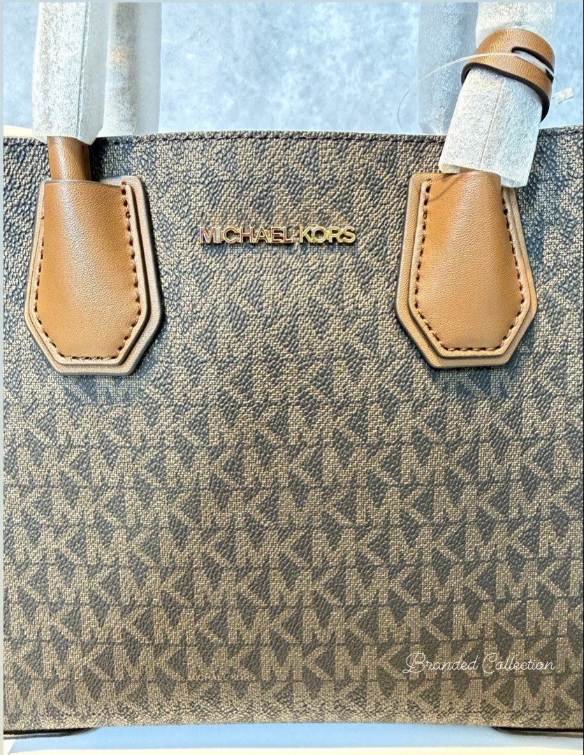 MK Mercer Crossbody Brown (Category: Cross-body Bags) located in Manila. Submitted by usbrandedcollections (Listing ID 1442353278, Image 2). Description: SKU: BAG-MKC-0023 Mercer Medium Crossbody Bag Brown Brun. Crafted from signature-print canvas and leather, our two-tone bag is updated with accordion side gussets. Removable shoulder strap. 90% coated canvas 9% polyester 1% polyurethane. Trim 100% leather. Gold tone hardware. 8.75”W X 7.5”W X 4”