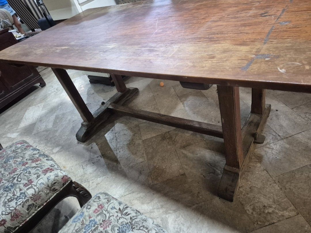Narra Wood Wide Dining Table with Sturdy Legs (Category: Tables & Sets) located in Taguig. Submitted by firesale123 (Listing ID 1442480678, Image 2). Description: - Made from Narra Wood - Brought in JO-LIZA Arts & Antiques for 75k - Solid wood dining table - Rectangular shape - Rustic finish - Thick, stable legs - Ideal for farmhouse or vintage dining areas - Generous surface space for meals and gatherings.