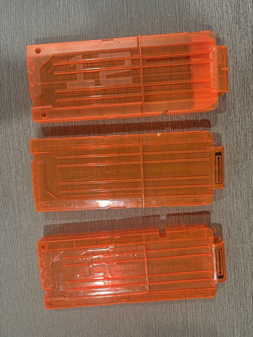 Nerf N-Strike Elite 12-round quick reload magazine. (Category: Action & Battle Toys) located in Manila. Submitted by dig76 (Listing ID 1442431155, Image 2). Description: P200 each This is a Nerf N-Strike Elite 12-round quick reload magazine. It is made of a clear orange plastic, allowing you to see the remaining darts. The magazine is designed for use with most Nerf Elite blasters..
