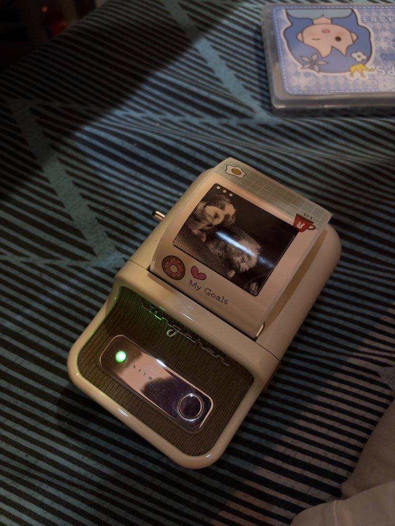Niimbot B21s Portable Thermal Photo Printer (Category: Printers, Scanners & Copiers) located in Lucena. Submitted by 0808sky (Listing ID 1442398860, Image 1). Description: unit only - no orig box - no charger (typec) ✅ Working perfectly ✅ Rechargeable ✅ Bluetooth connection ✅ Cute customized design ✅ Includes printer (and paper roll if included) Reason for selling: Not being used anymore..