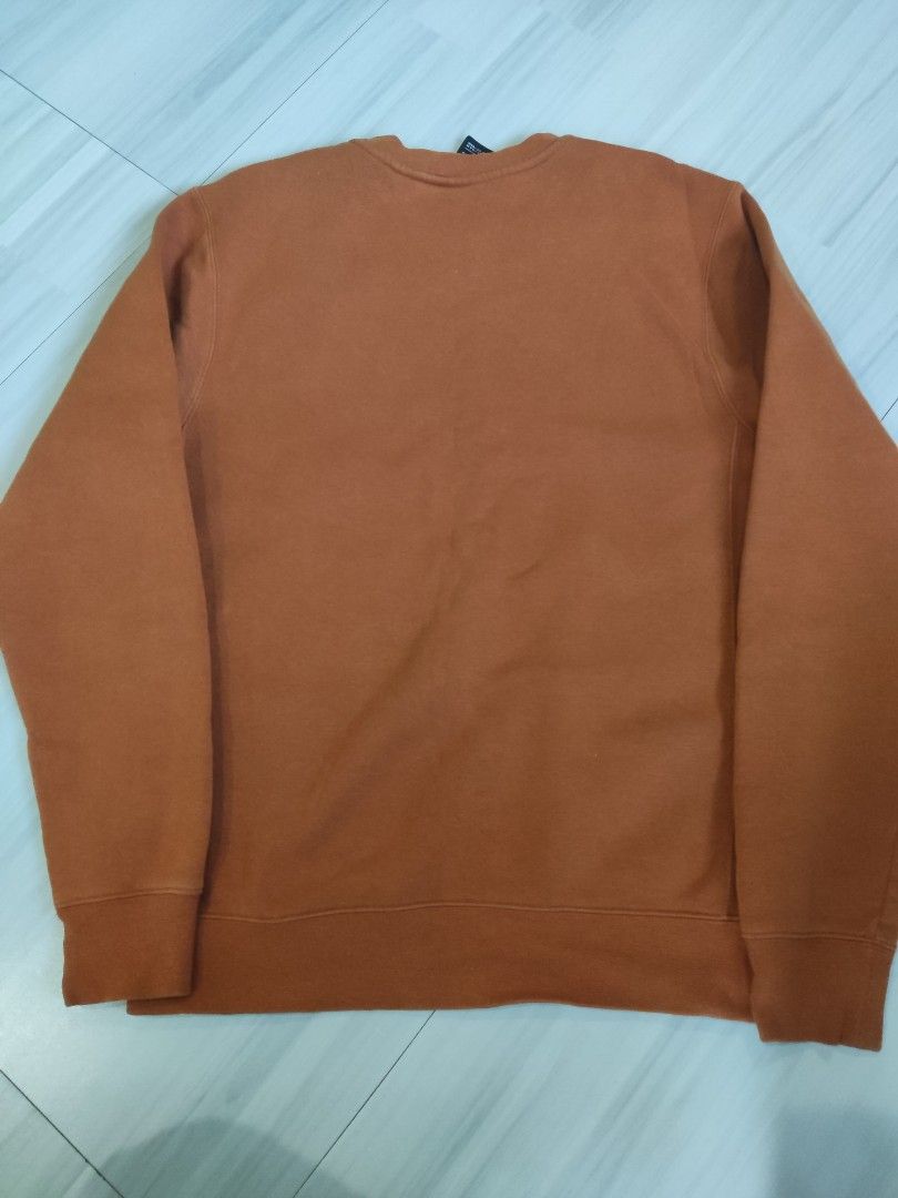 Nike Crewneck Sweatshirt - Brown - Size S (Category: Coats, Jackets and Outerwear) located in Bacoor. Submitted by pat0404 (Listing ID 1442449520, Image 2). Description: - Orange Nike crewneck sweatshirt - Size S - Made in Vietnam - Material: 60% Cotton, 20% Polyester - Ideal for casual wear - Features classic Nike logo on the chest - Long sleeves with ribbed cuffs and hem - Comfortable and classic design Small to Medium No issue.
