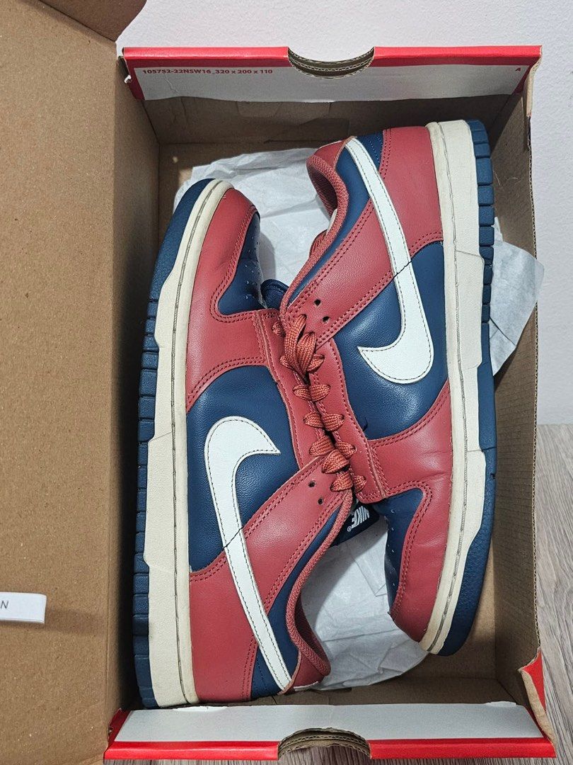 Nike Dunk Low “Canyon Rust” (Category: Sneakers) located in Taytay. Submitted by cloudy_20 (Listing ID 1442464928, Image 2). Description: - Classic Nike Dunks - Red, navy, and white colorway - Low-top silhouette - Includes original Nike box - Ideal for casual wear or collecting - Size: 9.5W (26.5cm) - SRP: 5,495.