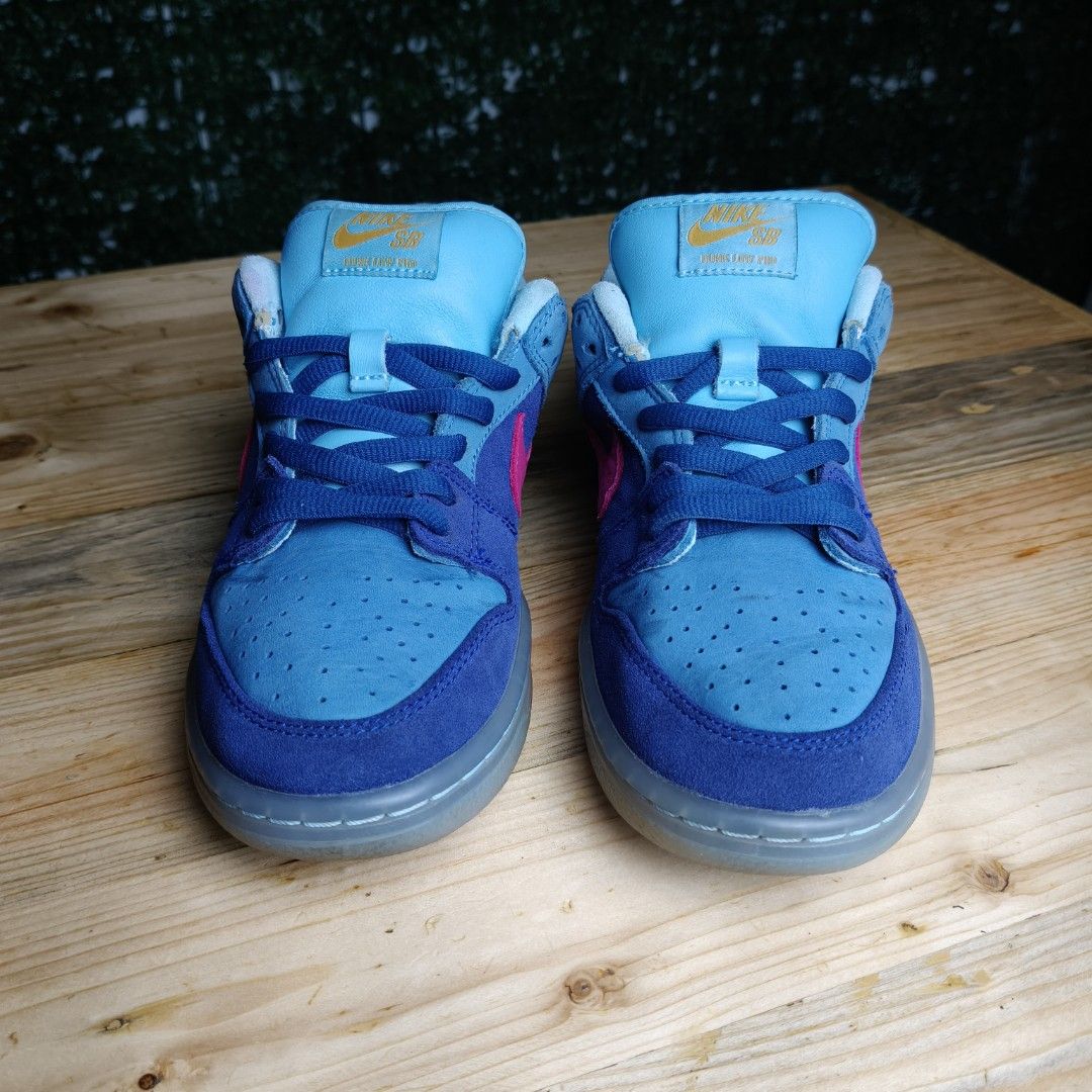 Nike SB Dunk Low " Run The Jewels " (Category: Sneakers) located in Tabaco. Submitted by souththrift4512 (Listing ID 1442509928, Image 2). Description: - Authentic Nike SB Dunk Low " Run The Jewels " - Striking blue and light blue colorway with vibrant pink accents - Signature Nike SB branding on the tongue - Unique translucent grey soles - Ideal for both everyday style and skateboarding performance no box and replaced insole pads.