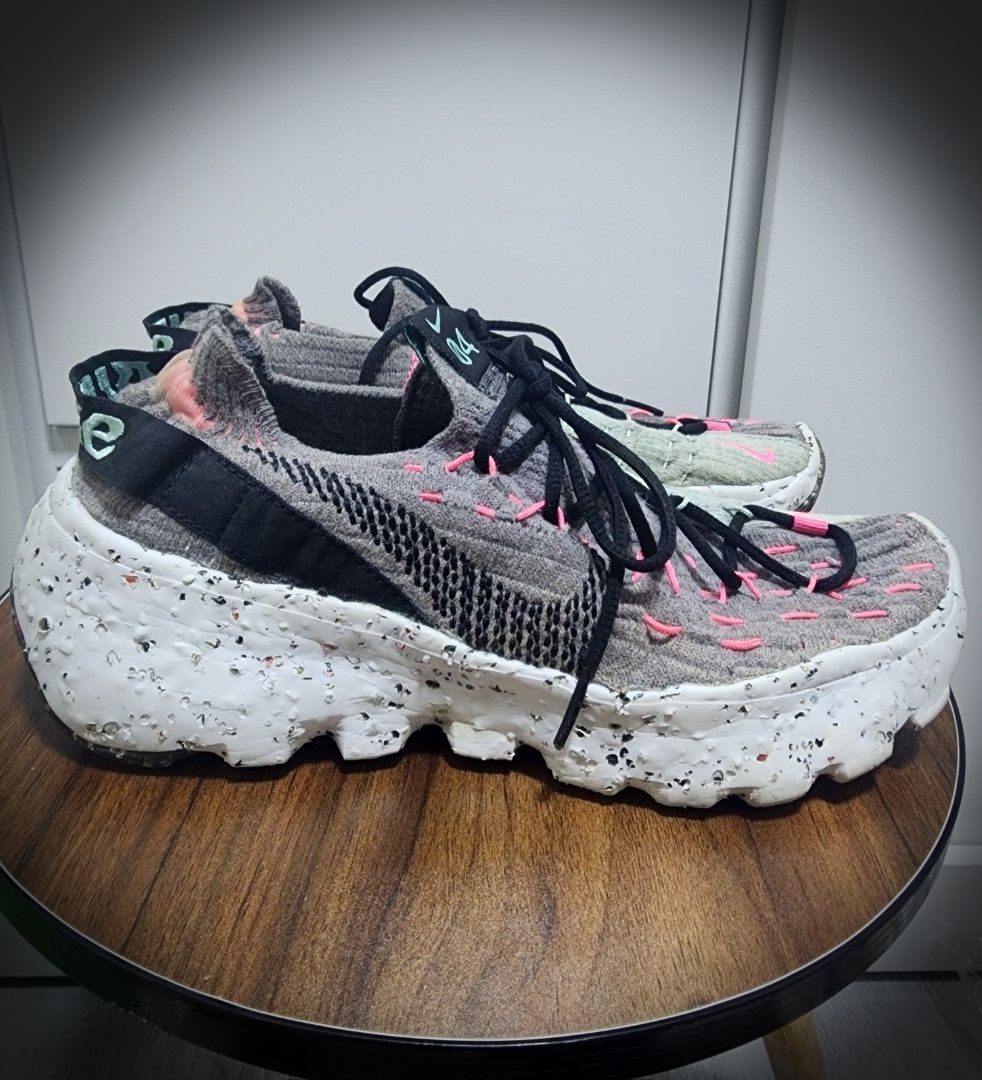 Nike Space Hippie 04 South Beach (Category: Sneakers) located in San Jose del Monte. Submitted by lberry08 (Listing ID 1442380063, Image 3). Description: Original Nike Space Hippie 04 sneakers. Smoke grey knit with pink/mint accents. Recycled speckled sole. Lace-up. Good for daily wear/light workouts. Made in Vietnam. With signs of wear/glue residue(check posted pictures for the details). Negotiable. 25cm in size..
