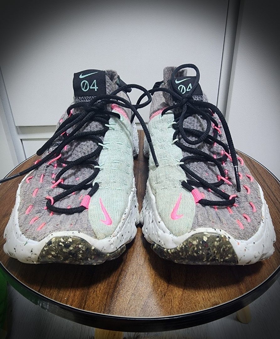 Nike Space Hippie 04 South Beach (Category: Sneakers) located in San Jose del Monte. Submitted by lberry08 (Listing ID 1442380063, Image 1). Description: Original Nike Space Hippie 04 sneakers. Smoke grey knit with pink/mint accents. Recycled speckled sole. Lace-up. Good for daily wear/light workouts. Made in Vietnam. With signs of wear/glue residue(check posted pictures for the details). Negotiable. 25cm in size..