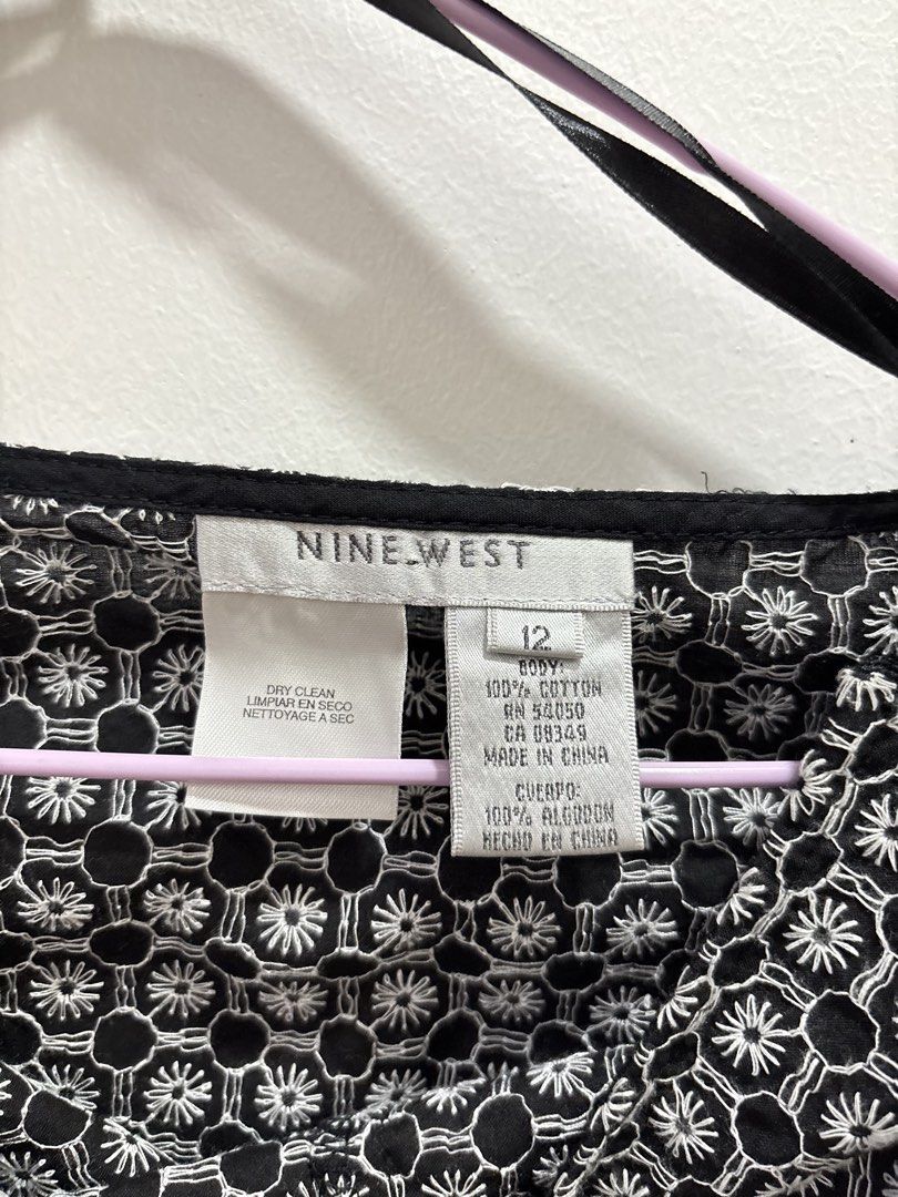 Nine West Black & White Patterned Midi Skirt Size 12 (Category: Skirts) located in Paranaque City. Submitted by sashimimai (Listing ID 1442445087, Image 2). Description: - Brand: Nine West - Style: Midi Skirt - Pattern: Black and White - Material: 100% Cotton - Size: 12 - Occasion: Perfect for casual wear or dressing up - Styling: Easy to pair with various tops.