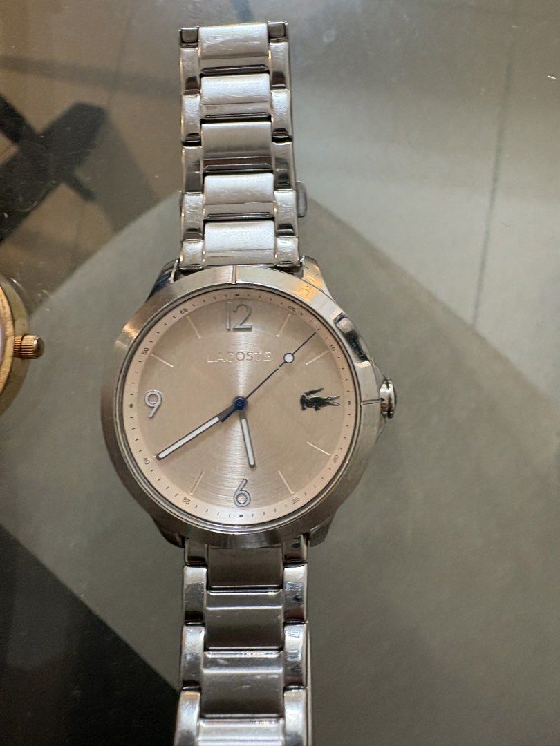 TAKE ALL 2 Olivia Burton & Lacoste Watches Bundle (Category: Women's Watches) located in Cabuyao City. Submitted by cassxx (Listing ID 1442443590, Image 2). Description: Take All 2 - Olivia Burton London Watch: White face, black leather strap, rose gold casing. - Lacoste Watch: Champagne face, stainless steel strap. - Perfect for adding a touch of elegance to any outfit..