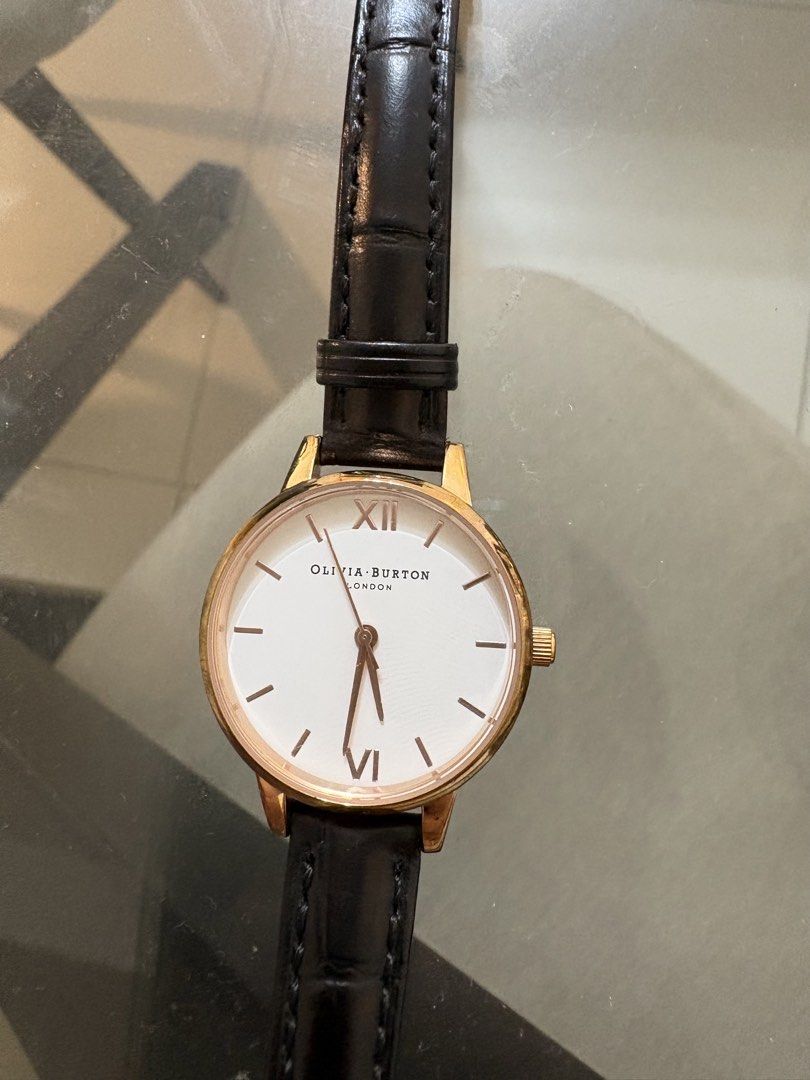 TAKE ALL 2 Olivia Burton & Lacoste Watches Bundle (Category: Women's Watches) located in Cabuyao City. Submitted by cassxx (Listing ID 1442443590, Image 3). Description: Take All 2 - Olivia Burton London Watch: White face, black leather strap, rose gold casing. - Lacoste Watch: Champagne face, stainless steel strap. - Perfect for adding a touch of elegance to any outfit..