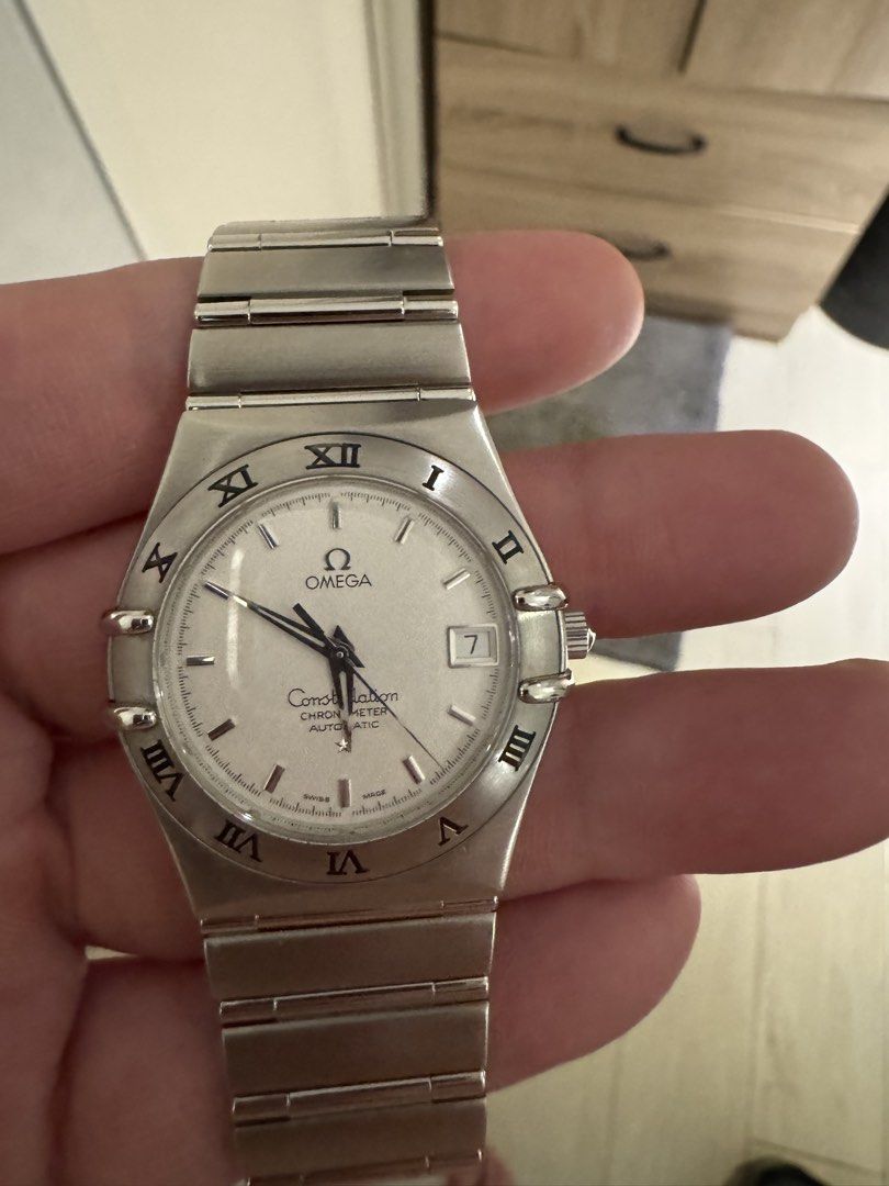 Omega Constellation LM Chronometer 35mm 17cm (Category: Luxury Watches) located in Makati City. Submitted by marckyboy (Listing ID 1442498551, Image 3). Description: - Omega Constellation Automatic Watch - Elegant silver dial with Roman numeral hour markers - Convenient date window at 3 o'clock - Durable stainless steel bracelet - Includes original box - Ideal for watch collectors Product name Constellation Light Messenger Item Number 012109F Mod