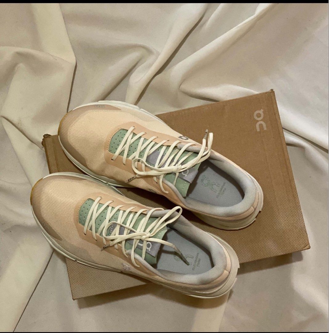 ON Cloudswift Running Shoes Dew&Mineral (Category: Sneakers) located in Pres. Manuel A. Roxas. Submitted by backstyle (Listing ID 1442355159, Image 3). Description: - ON Cloudswift running shoes in a stylish Peach and Mint colorway. - Experience lightweight comfort for your runs. - Unique sole design offers excellent cushioning. - Features light cream laces. - Comes with the original box. - Ideal for both training sessions and everyday wear. - no