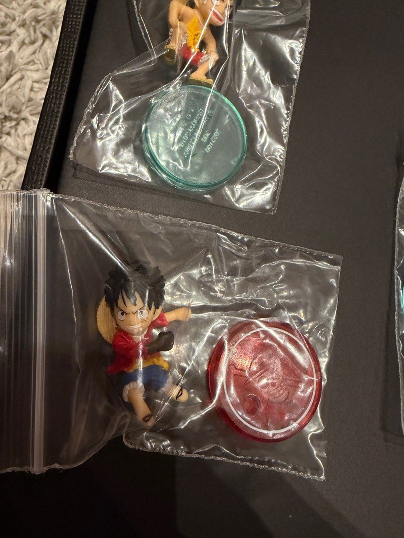 ONE PIECE COLLECTION SD Figures BANDAI Luffy Doflamingo Shanks Law Vergo (Category: Toy Figures) located in Singapore. Submitted by hobbymart (Listing ID 1442520349, Image 4). Description: One Piece SD Collection Mini Figures by BANDAI - Out of production blind boxes! Used to retail for $6.90 each, now letting each go for $3. You can also choose to try your luck (random draw) at $2.50 each, or grab all for $18 :) Displayed in glass cabinet before