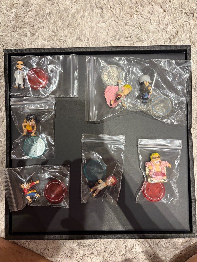 ONE PIECE COLLECTION SD Figures BANDAI Luffy Doflamingo Shanks Law Vergo (Category: Toy Figures) located in Singapore. Submitted by hobbymart (Listing ID 1442520349, Image 2). Description: One Piece SD Collection Mini Figures by BANDAI - Out of production blind boxes! Used to retail for $6.90 each, now letting each go for $3. You can also choose to try your luck (random draw) at $2.50 each, or grab all for $18 :) Displayed in glass cabinet before