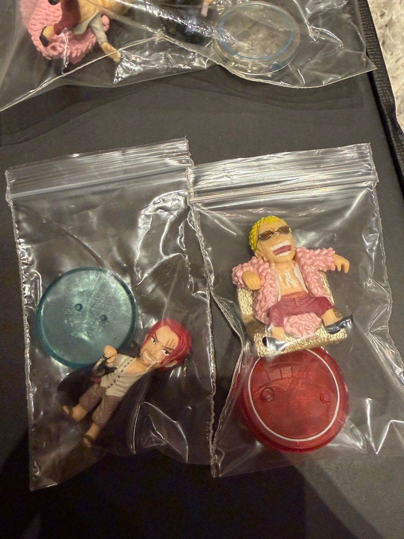 ONE PIECE COLLECTION SD Figures BANDAI Luffy Doflamingo Shanks Law Vergo (Category: Toy Figures) located in Singapore. Submitted by hobbymart (Listing ID 1442520349, Image 5). Description: One Piece SD Collection Mini Figures by BANDAI - Out of production blind boxes! Used to retail for $6.90 each, now letting each go for $3. You can also choose to try your luck (random draw) at $2.50 each, or grab all for $18 :) Displayed in glass cabinet before