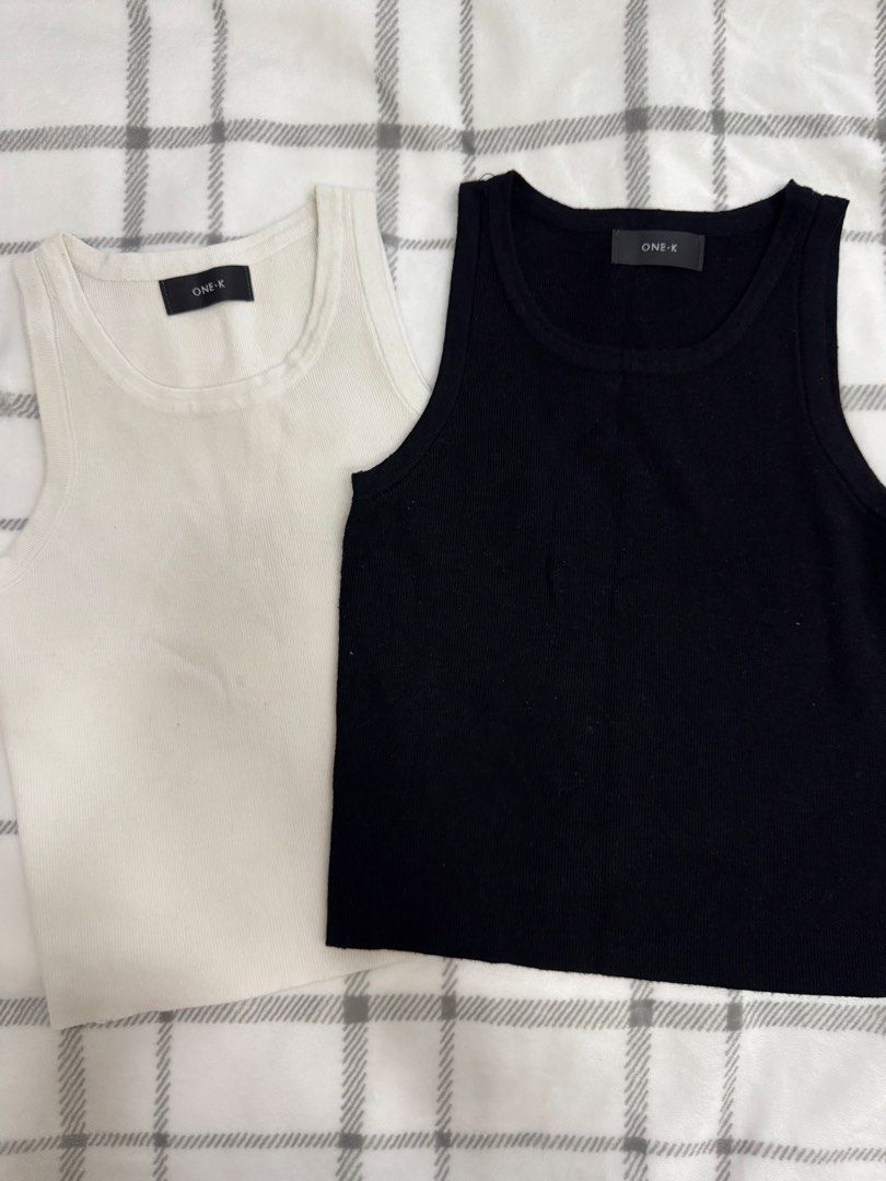 ONE-K Ribbed Tank Tops (Black & White) (Category: Sleeveless) located in Pasig City. Submitted by regden (Listing ID 1442378001, Image 1). Description: - Set of 2 ONE-K ribbed tank tops - Colors: 1 Black, 1 White - Classic sleeveless design - Comfortable and versatile material - Ideal for layering or wearing on its own - Essential wardrobe basics.