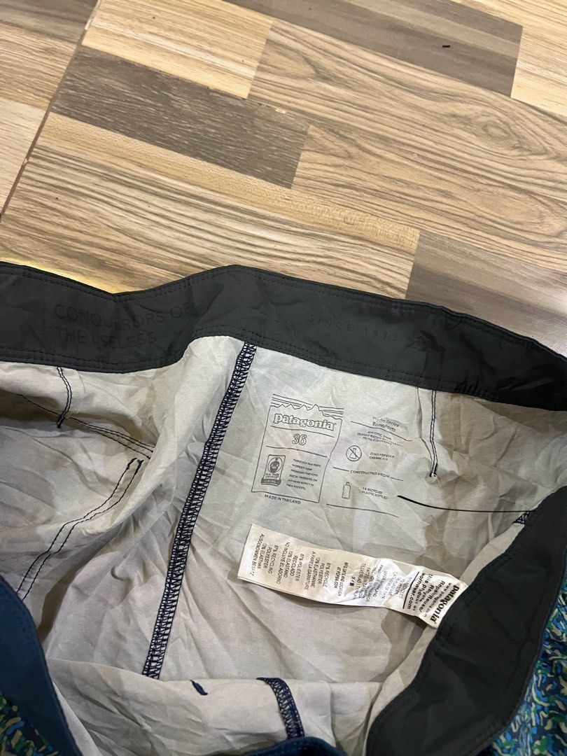Patagonia Hydropeak Board Shorts (Category: Swim Trunks & Board Shorts) located in Iba. Submitted by saploot (Listing ID 1442469037, Image 3). Description: - Patagonia Board Shorts - Size: 36 - Design: All-over pattern in blue, green, and yellow - Features: Elastic waistband with drawstring, back pocket with velcro closure - Ideal for: Swimming, lounging, beach activities.