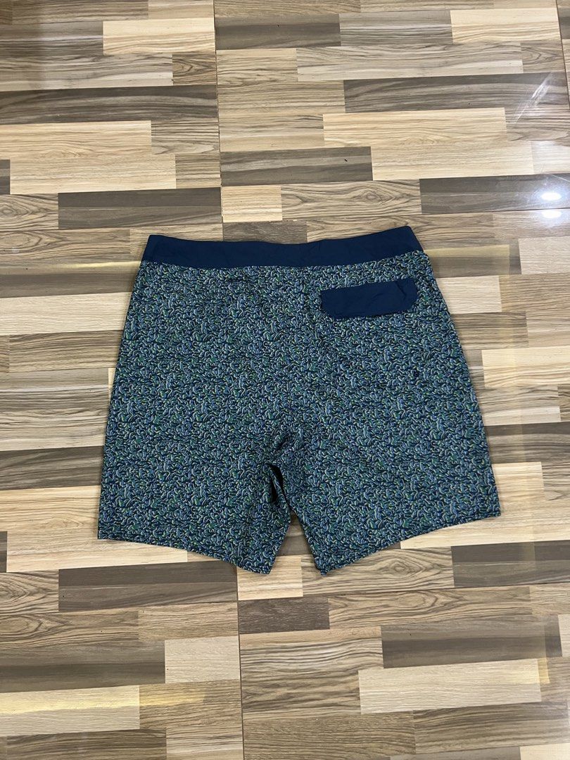 Patagonia Hydropeak Board Shorts (Category: Swim Trunks & Board Shorts) located in Iba. Submitted by saploot (Listing ID 1442469037, Image 2). Description: - Patagonia Board Shorts - Size: 36 - Design: All-over pattern in blue, green, and yellow - Features: Elastic waistband with drawstring, back pocket with velcro closure - Ideal for: Swimming, lounging, beach activities.