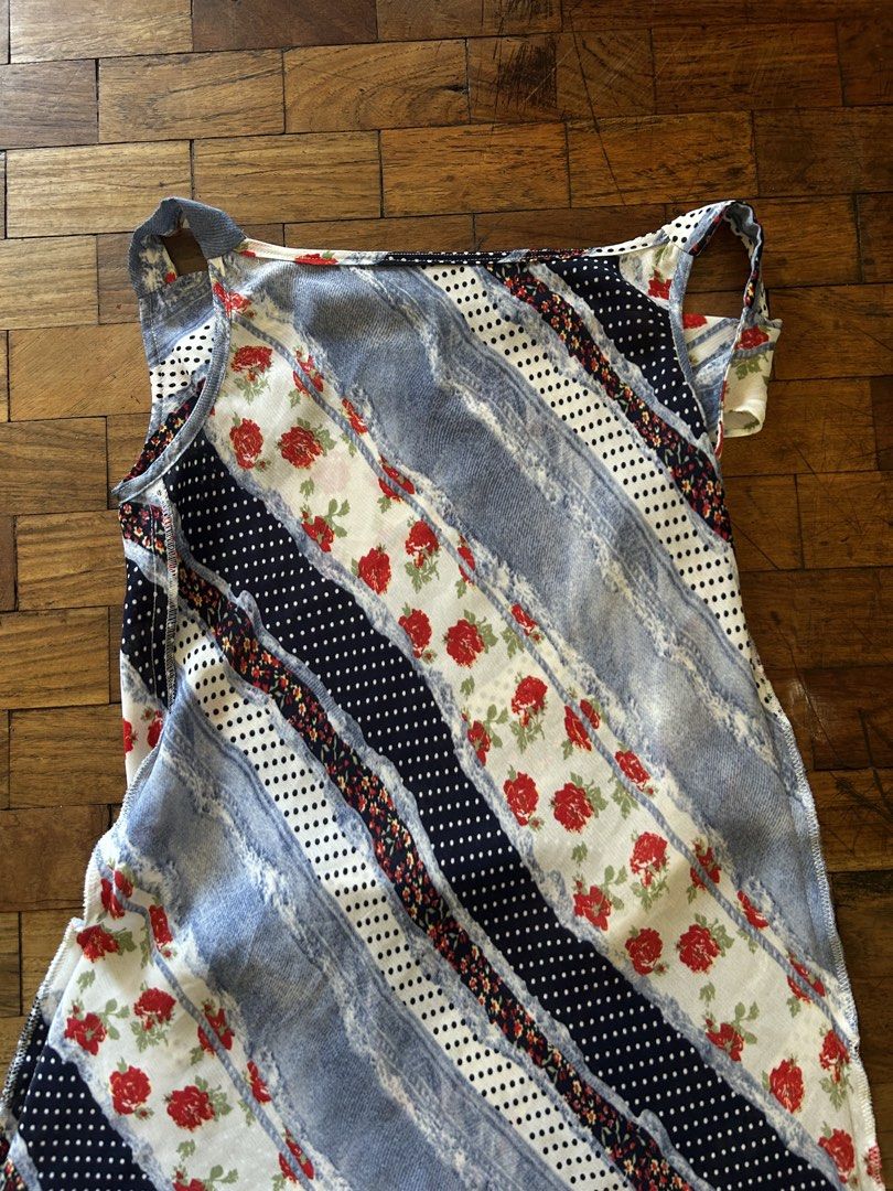 Patchwork Floral Sleeveless Mini Dress (Category: Dresses) located in Manila. Submitted by d.artchives (Listing ID 1442352848, Image 2). Description: - Fun patchwork design with a mix of floral, polka dot, and denim-like fabrics. - Features a vibrant red rose print. - Sleeveless with a unique strap detail on the shoulders. - Versatile: great for casual outings or as a stylish beach cover-up. - Eye-catching and one-of-a-kind style..